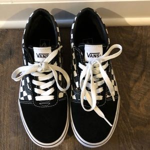 Youth sized black and white checkered Vans